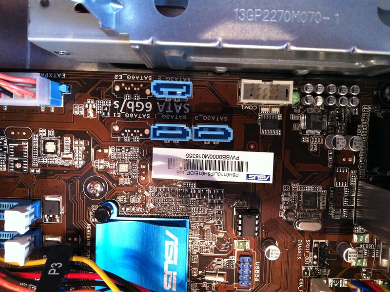 File:ASUS P6-P8H61E S1155 SATA II ports and serial header.jpg